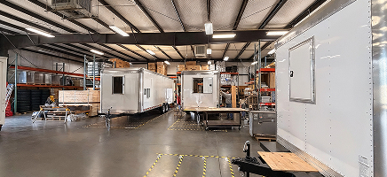 Custom food trailers under fabrication at the Golden State Trailers manufacturing facility