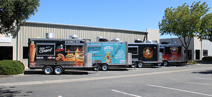 Completed custom food trailers prepared for delivery at Golden State Trailers