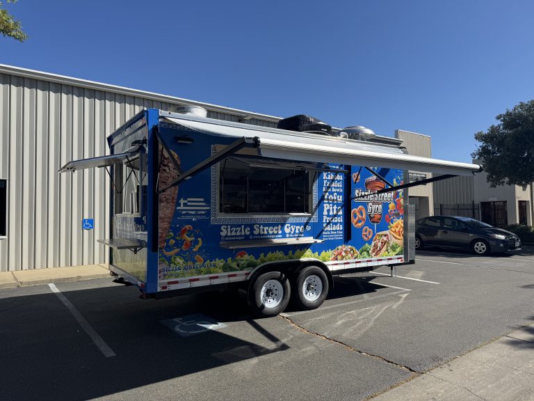 custom food trailer exterior with protective awning and weather-resistant construction