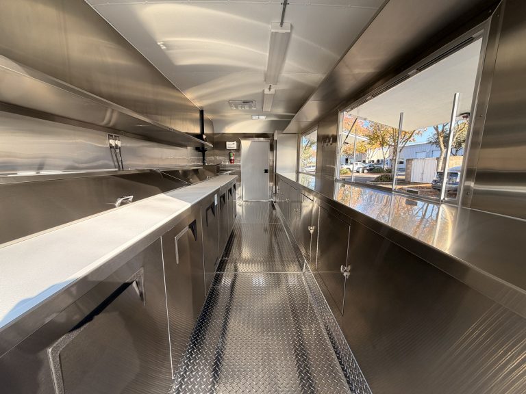Prep counter and serving window inside 20ft training food trailer in Bonita CA