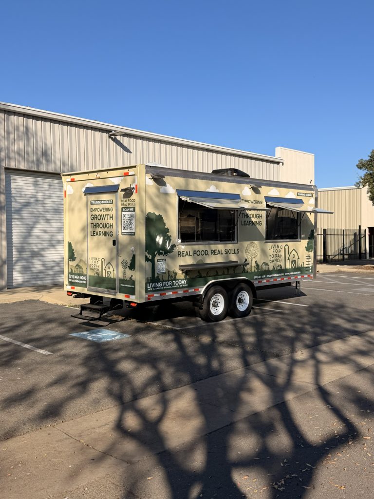Angled view of 20ft training food trailer in Bonita CA with dual serving windows