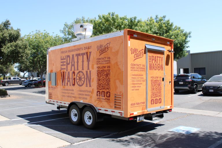 16ft burger food trailer rear passenger side three-quarter view orange wrap branding - The Patty Wagon San Jose CA Golden State Trailers