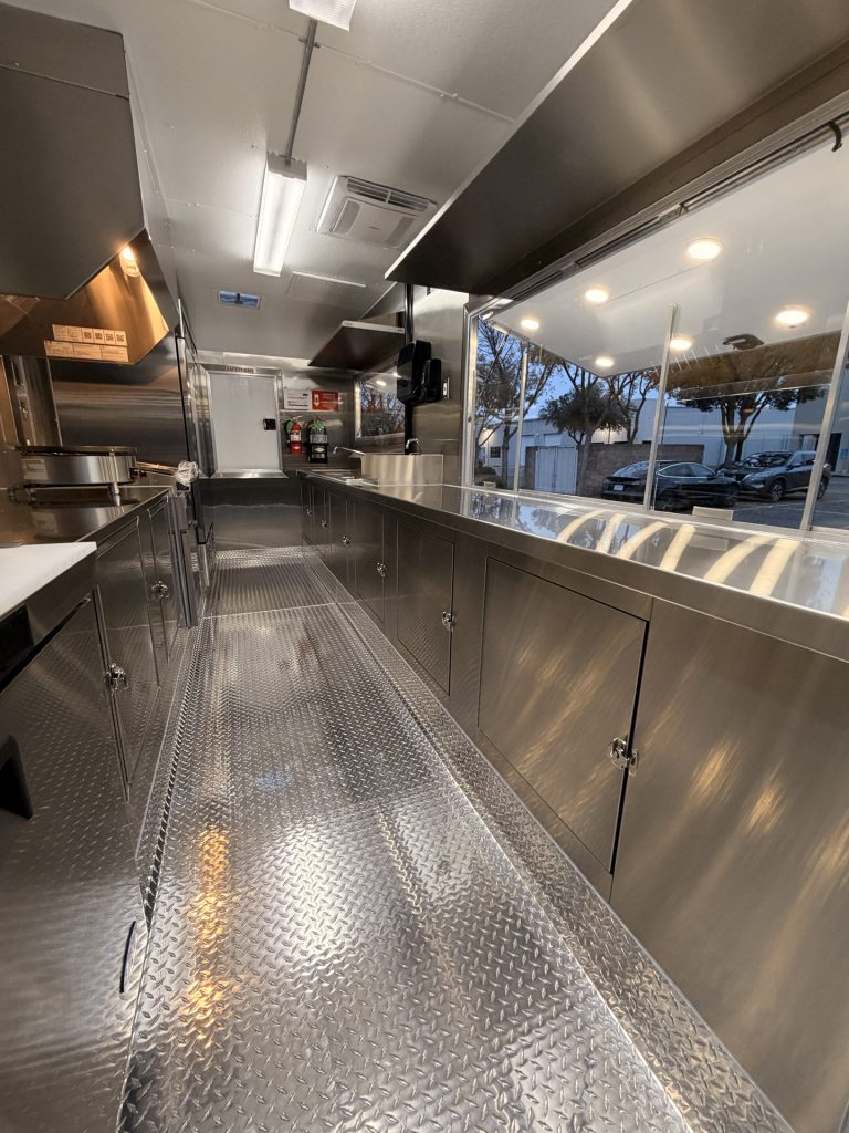 Interior of Coffee Trailer for Sale in Fair Oaks CA with stainless steel counters and service window