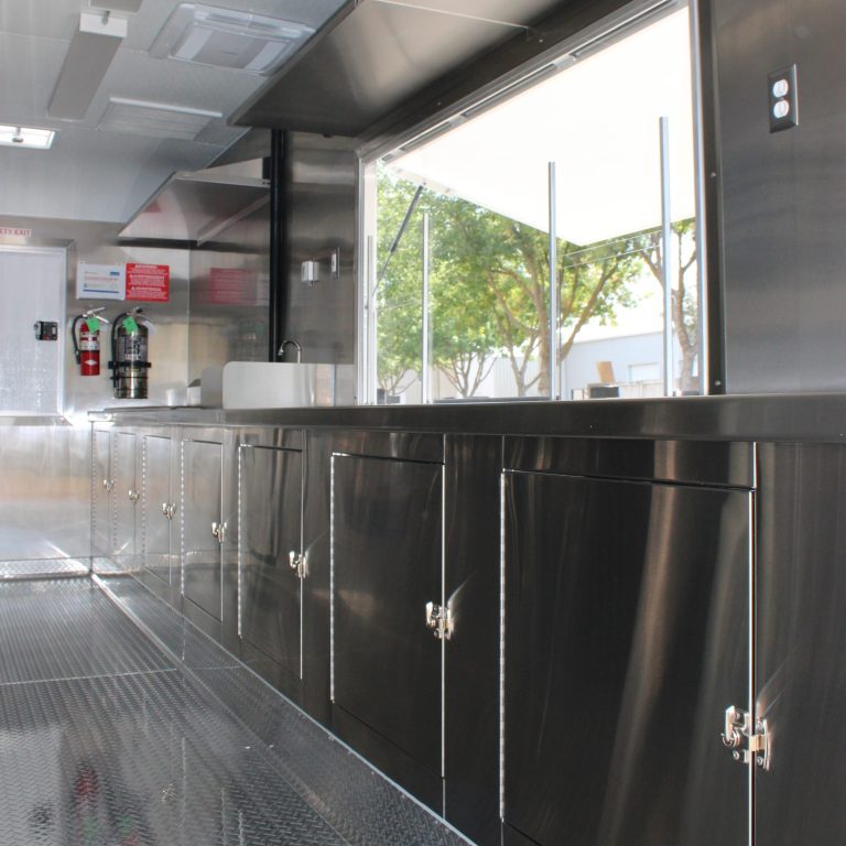 Food trailer interior service window and welded stainless steel cabinets - Million Dollar Spot 18ft trailer Tracy CA