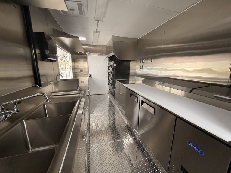 Triple sink and prep counter inside pizza food trailer in Arroyo Grande CA