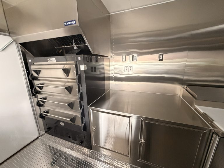 Stacked commercial pizza ovens inside pizza food trailer in Arroyo Grande CA