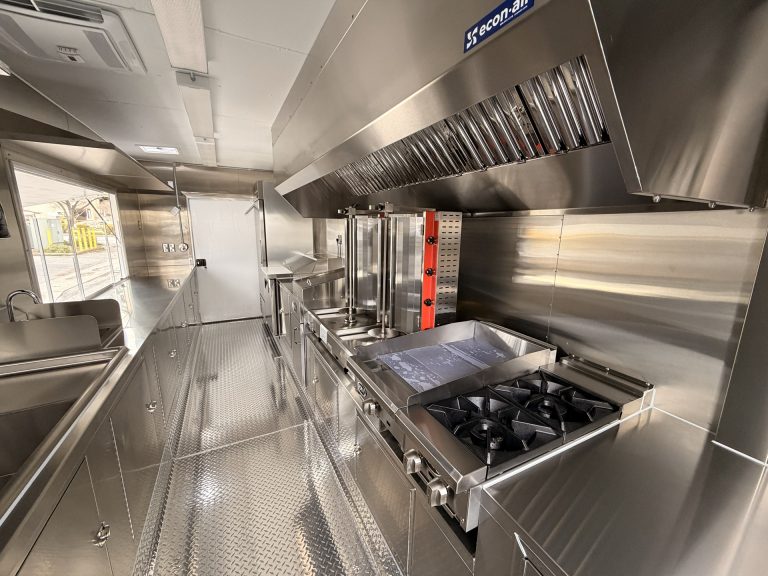 Full kitchen interior of BBQ Food Trailer in San Jose CA with range and shawarma broiler