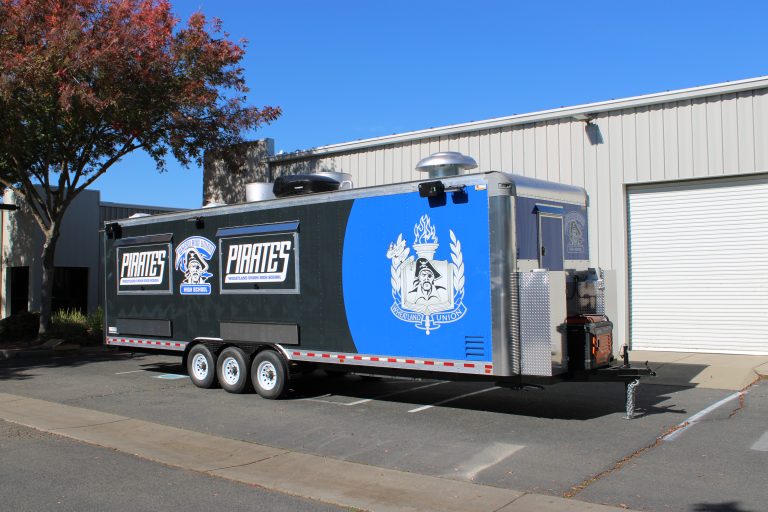 Front angle view of 30ft school concession trailer in Wheatland CA with Pirates graphics