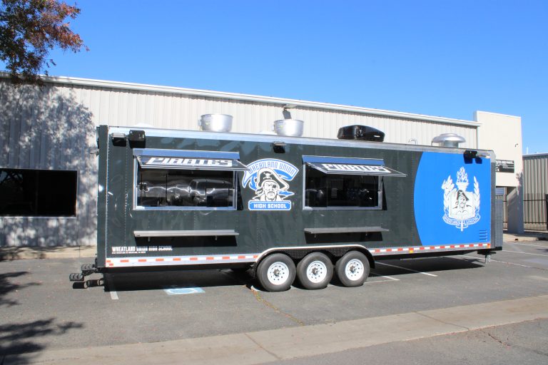 Full side profile of 30ft school concession trailer in Wheatland CA with dual serving windows