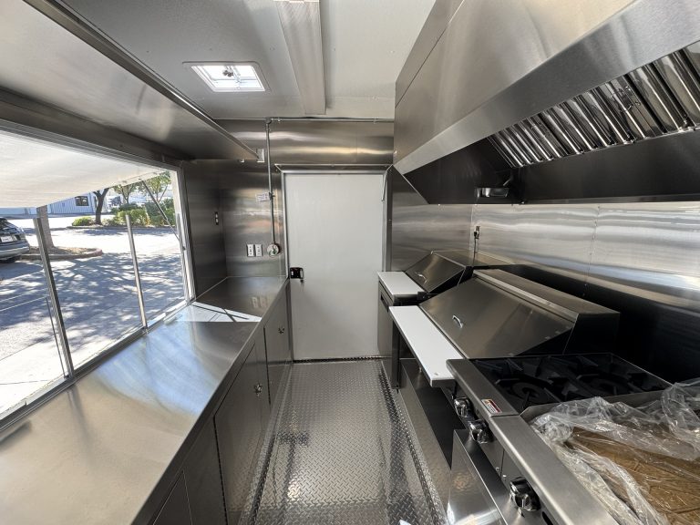 Cooking line and service counter inside 16ft taco food trailer in Watsonville CA