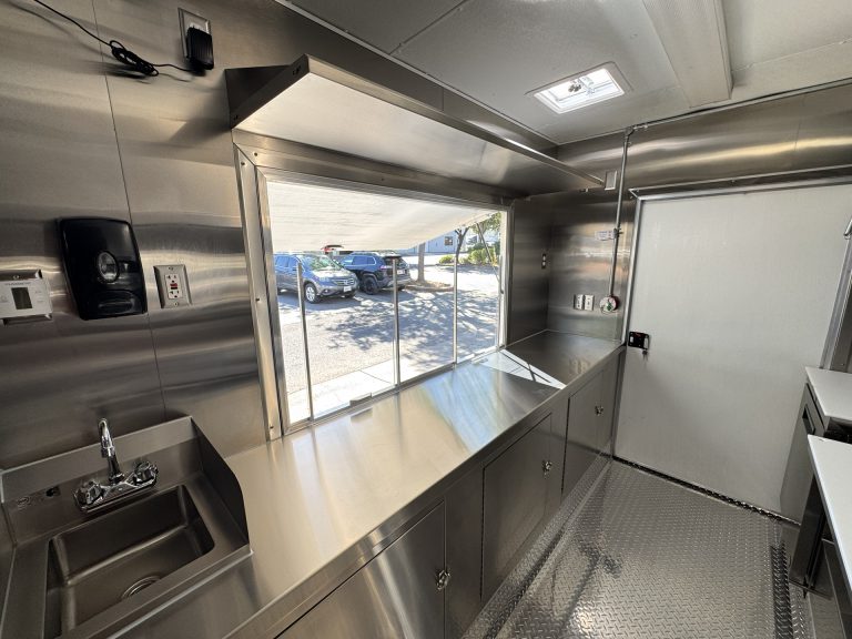 Service window and handwash sink inside 16ft taco food trailer in Watsonville CA