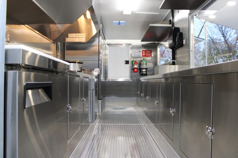 Interior aisle of Coffee Trailer for Sale in Fair Oaks CA with stainless cabinets