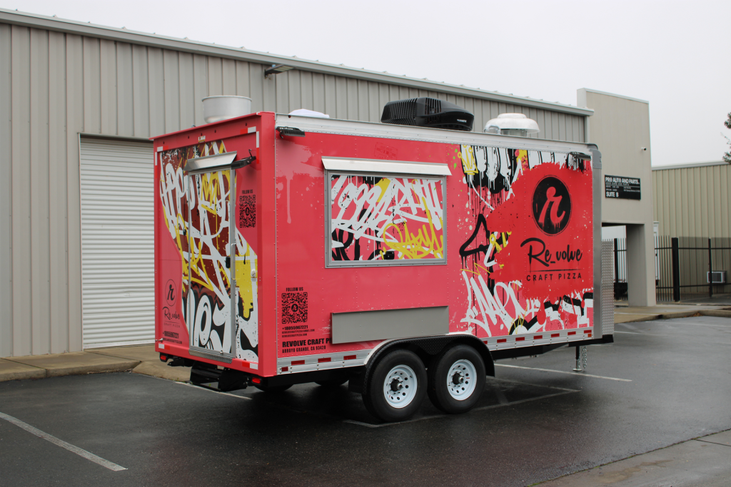 Red Revolve Craft Pizza food truck with a full graffiti-style vinyl wrap by Golden State Trailers