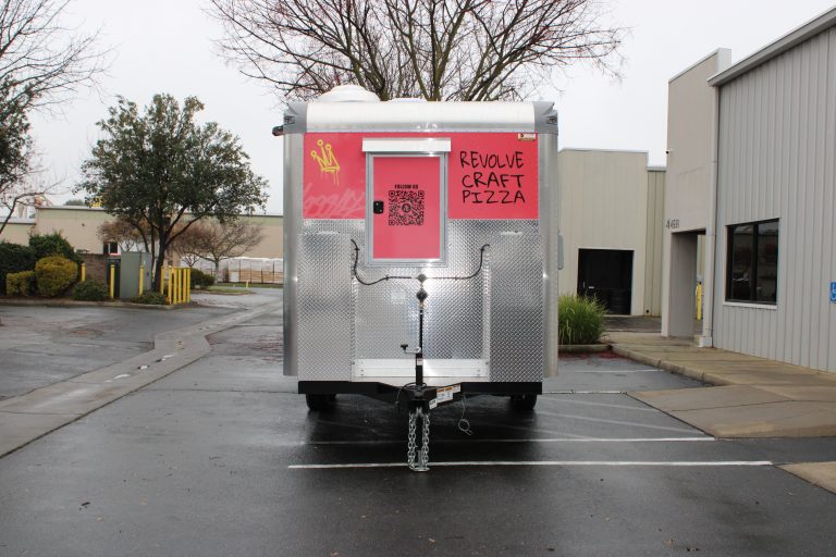 Revolve Craft Pizza food trailer front view with diamond plate nose