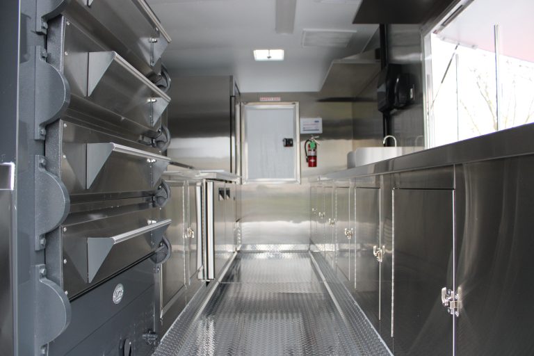 Interior of 16 ft pizza food trailer with commercial deck ovens