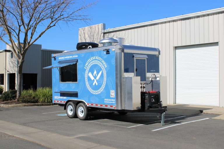 Limitless Kitchen custom 16ft food trailer full exterior view with blue 3M vinyl wrap, serving window and commercial rooftop equipment, Martinez CA
