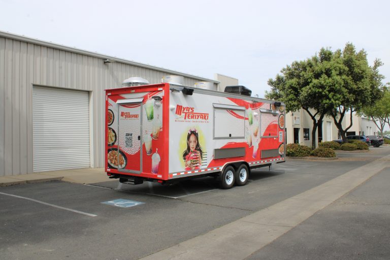 Mya's Teriyaki 24ft food trailer rear three-quarter view showing back door, utility compartments and full 3M wrap, custom build Golden State Trailers