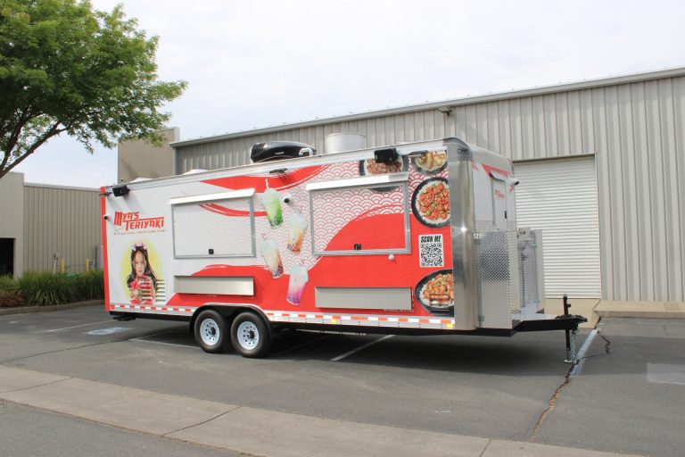 Mya's Teriyaki custom 24ft Asian food trailer front-side view with open concession window, awning and boba tea graphics on 3M wrap