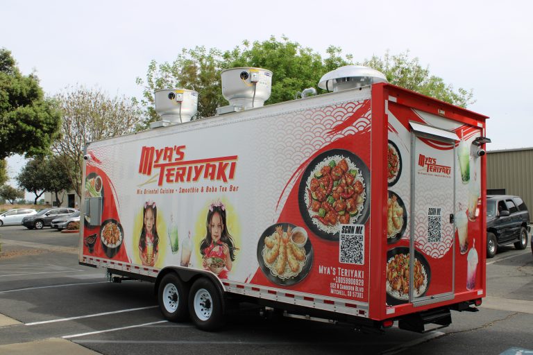Mya's Teriyaki food trailer rear wall view with full 3M vinyl wrap, menu graphics, QR code and contact details, custom build by Golden State Trailers