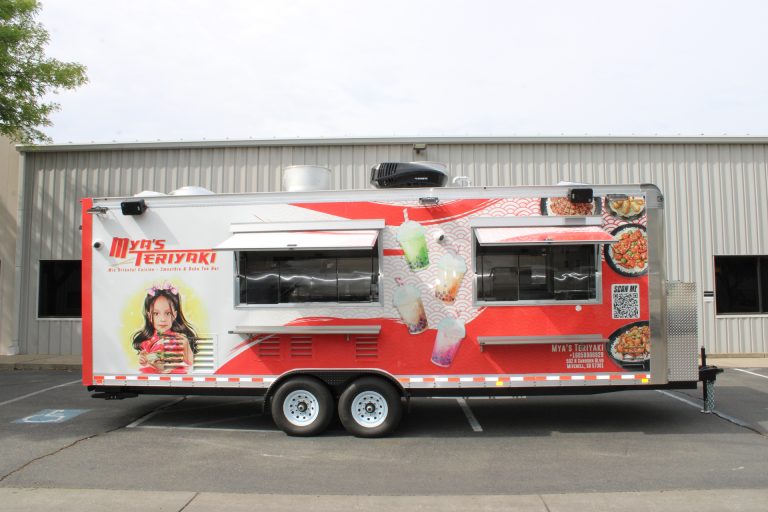 Mya's Teriyaki 24ft food trailer exterior side view with vibrant red 3M wrap design and commercial serving windows, Mitchell SD