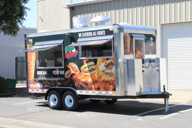16ft Mexican catering trailer with serving window, food graphics, and polished aluminum front section