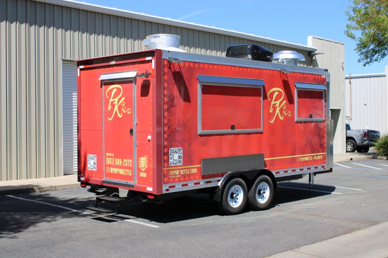 18ft kettle corn trailer with serving windows, rooftop ventilation, and custom red wrap in California
