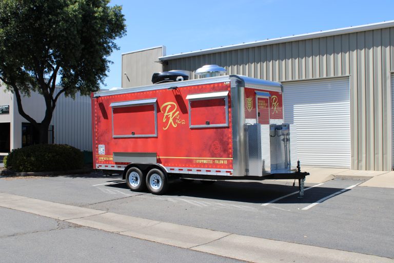 18ft kettle corn trailer with custom red wrap and polished aluminum nose section in California