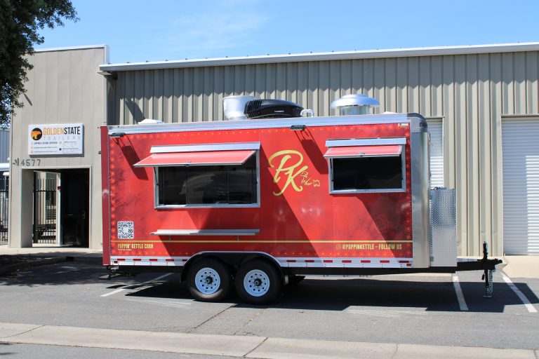 18ft kettle corn concession trailer with dual serving windows and custom red wrap in California
