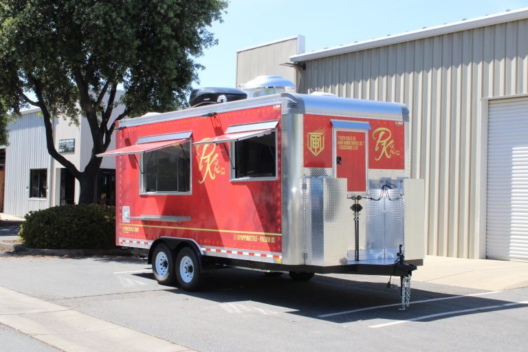 18ft kettle corn trailer with red custom wrap and dual concession windows in California
