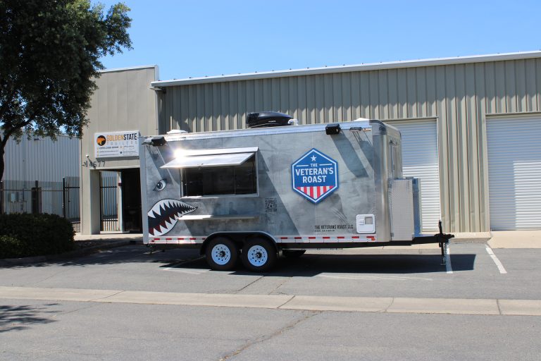 18ft American food trailer with military-themed wrap and concession window in Nashua NH