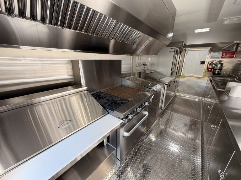 Food trailer commercial kitchen cooking line with stainless steel range hood and NSF certified equipment San Jose CA