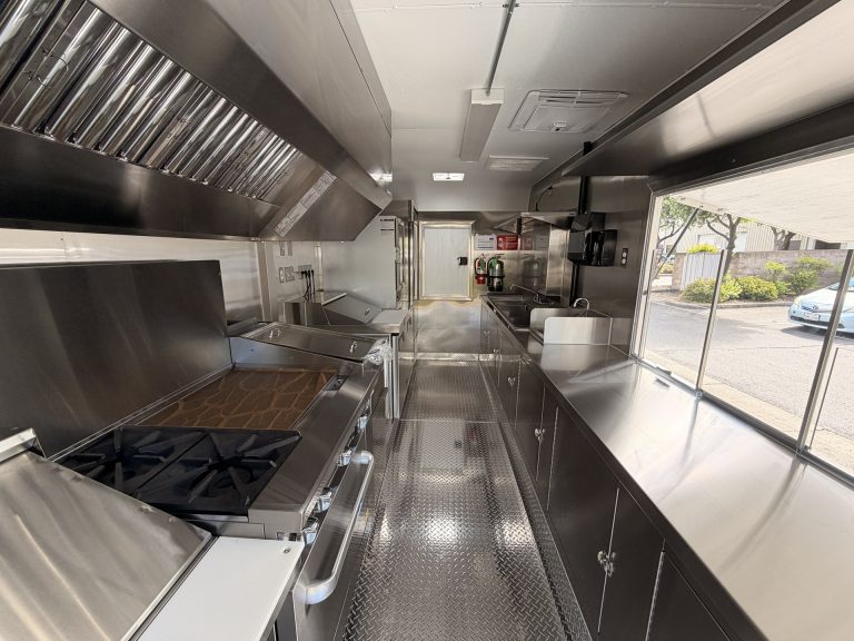 16ft food trailer open kitchen layout stainless steel worktops service window and fire suppression system Golden State Trailers