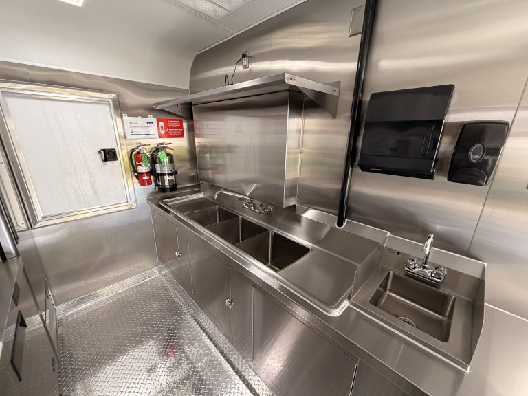 Food trailer three compartment sink handwash station stainless steel cabinets and fire extinguisher health code compliant build