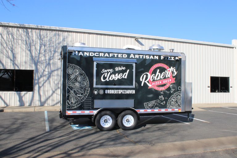 16ft pizza food trailer with artisan pizza wrap and tandem axle setup in Hills California