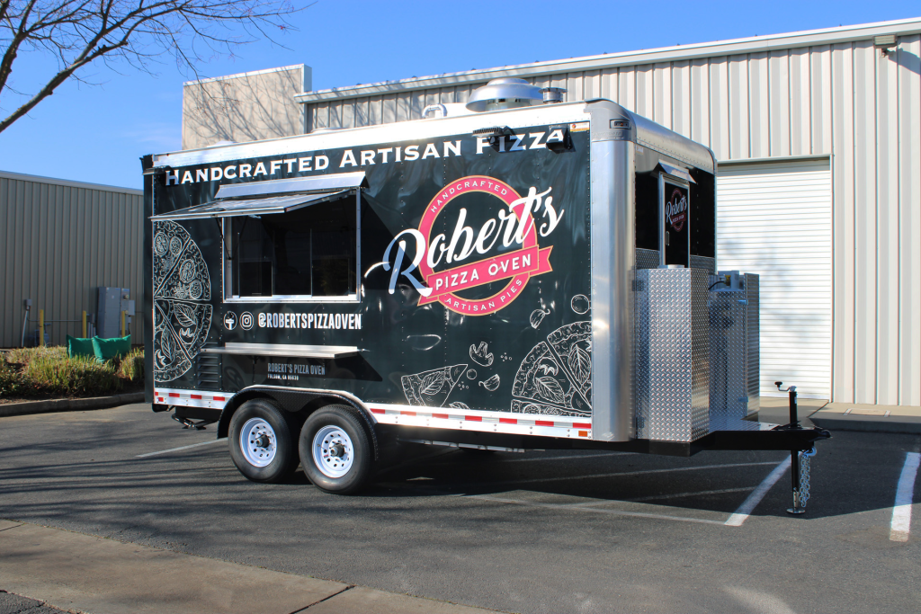 Robert’s Pizza Oven food trailer with handcrafted artisan pizza branding, a wood-fired pizza truck design.
