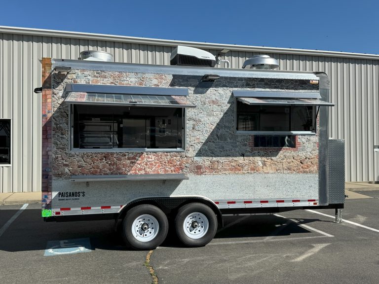 16ft golf course food trailer with dual serving windows and stone texture wrap in California