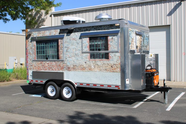 16ft golf course food trailer with stone texture wrap and tandem axle setup in Browns Valley California