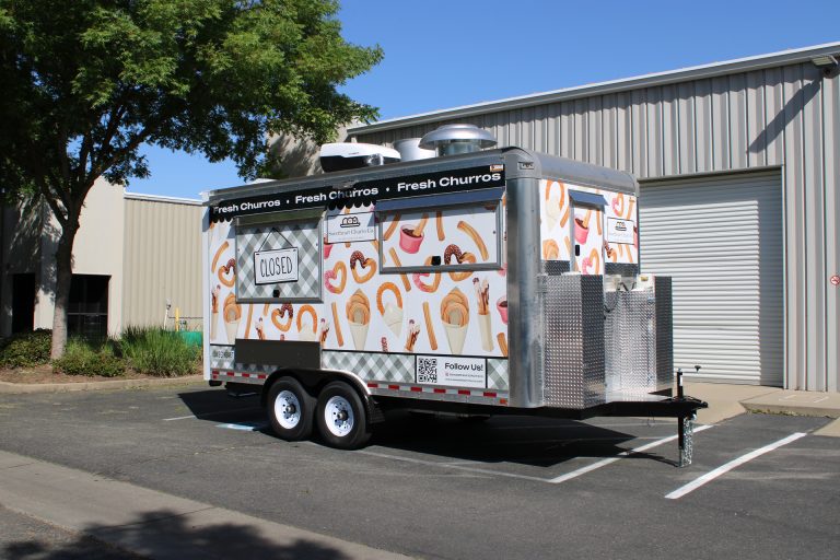 16ft churro food trailer rear passenger side three-quarter view white churro wrap diamond plate utility box - Sweetheart Churro Co Minden NV Golden State Trailers