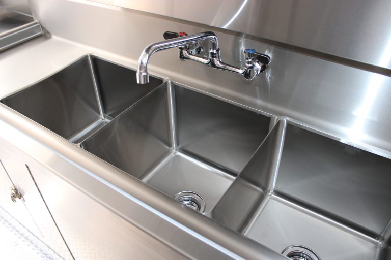 three-compartment sink inside commercial pizza food trailer