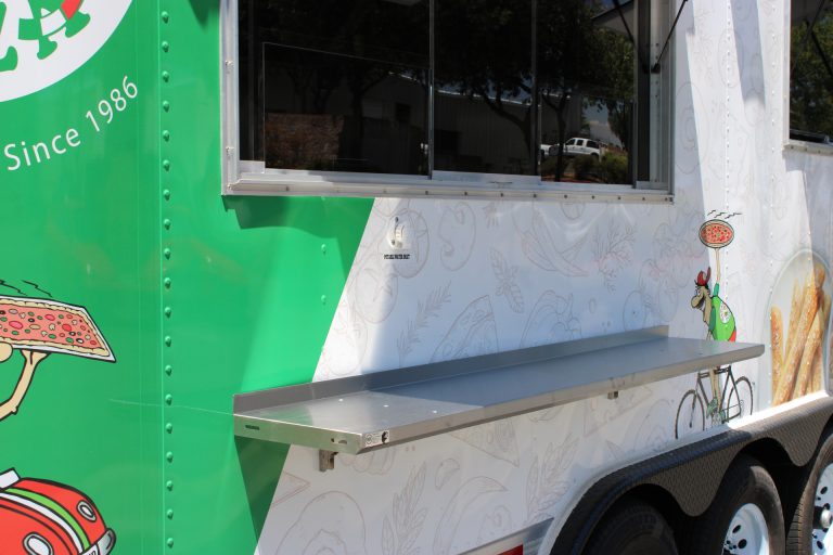 pizza food trailer service window with stainless steel exterior shelf