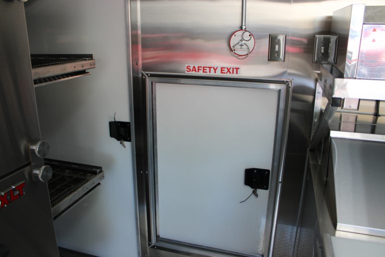 safety exit door inside custom pizza food trailer