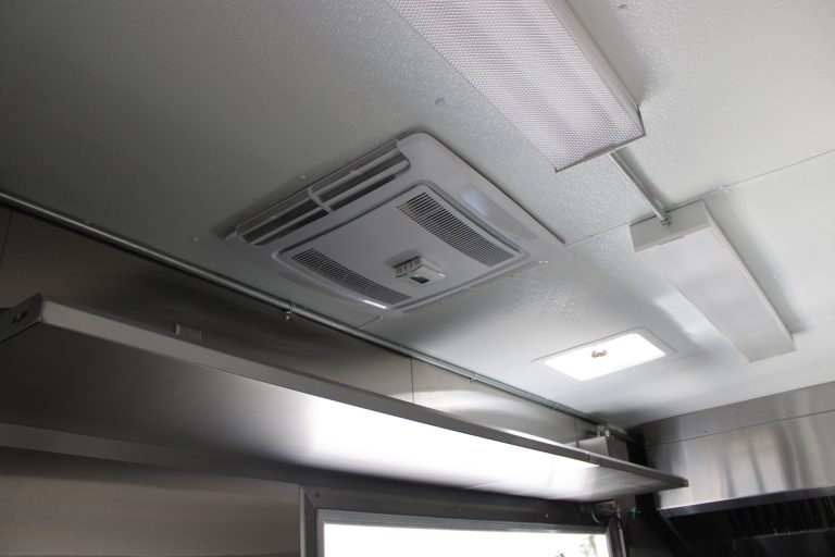 roof-mounted air conditioning inside commercial pizza food trailer