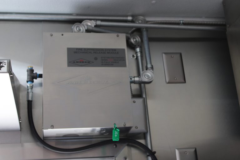 electrical service equipment inside commercial pizza food trailer