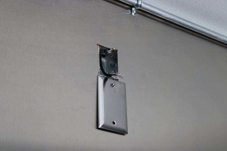 wall-mounted utility connection inside pizza food trailer