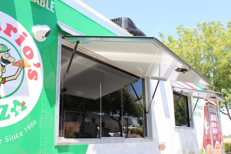 open concession window on custom mobile pizza kitchen
