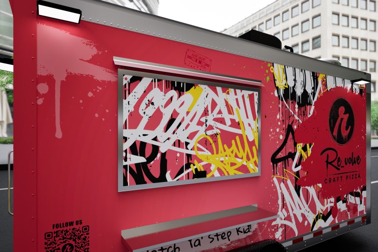 Revolve Craft Pizza trailer service window close up with graffiti wrap