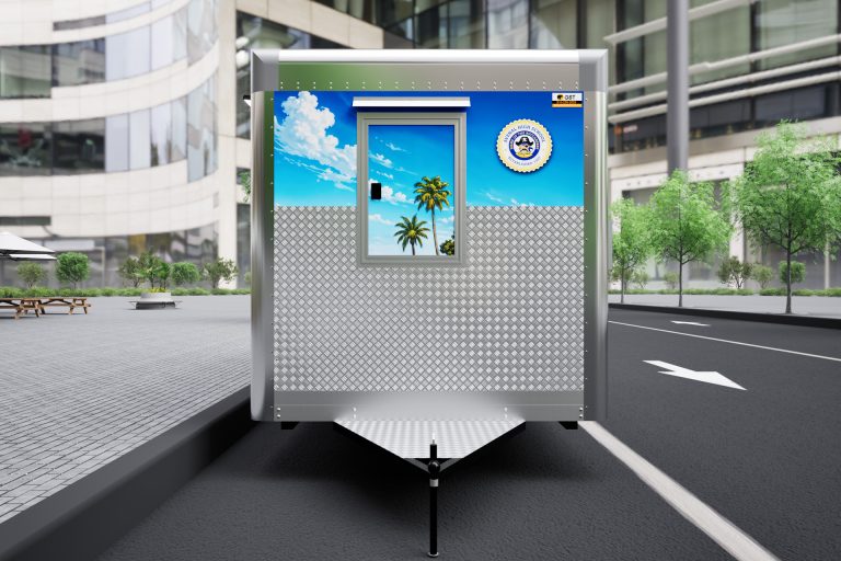 Front 3D view of the food trailer with entry door, Avenal High School emblem, and diamond-plate paneling