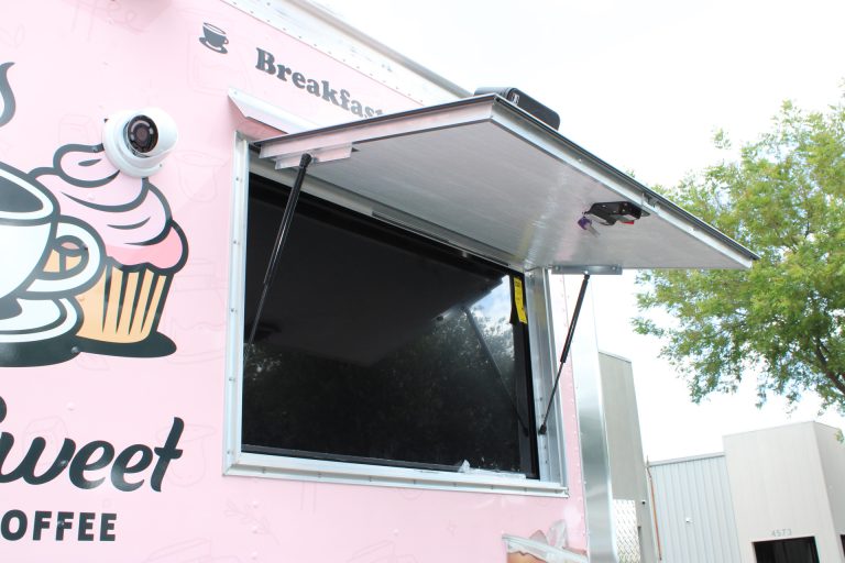Coffee food trailer service window and equipment.