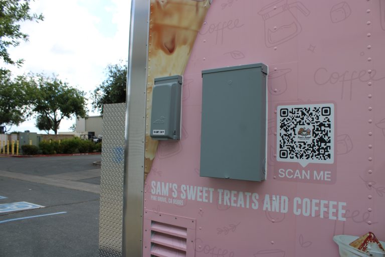 Sam’s Sweet Treats coffee trailer exterior branding.