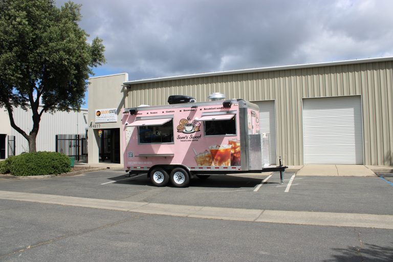 Custom coffee and dessert trailer with branded exterior.